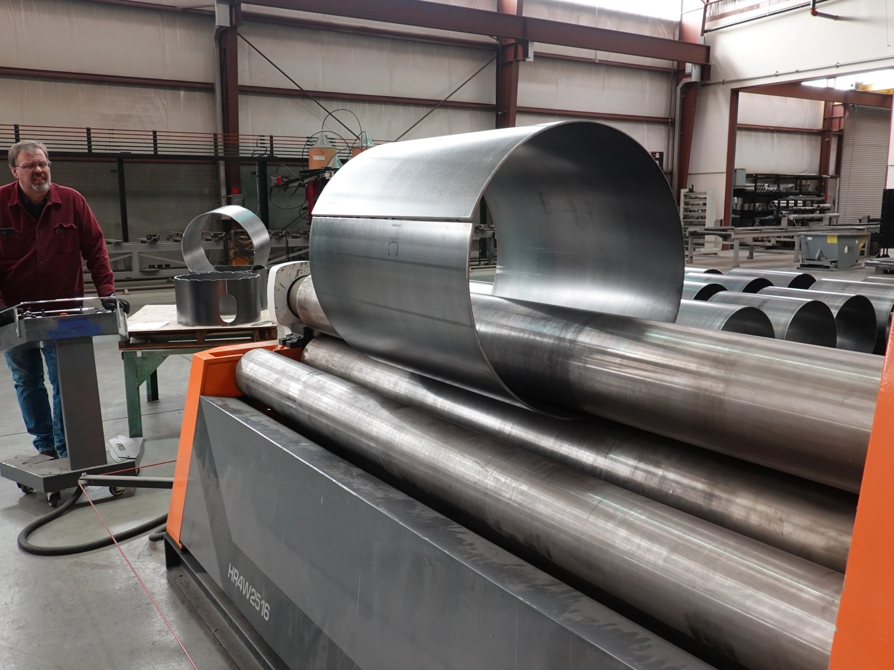 Rolling steel plates into tank walls