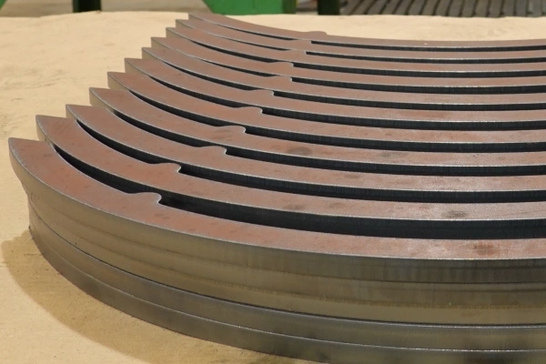 Stacks of mid-sized parts cut out of 1