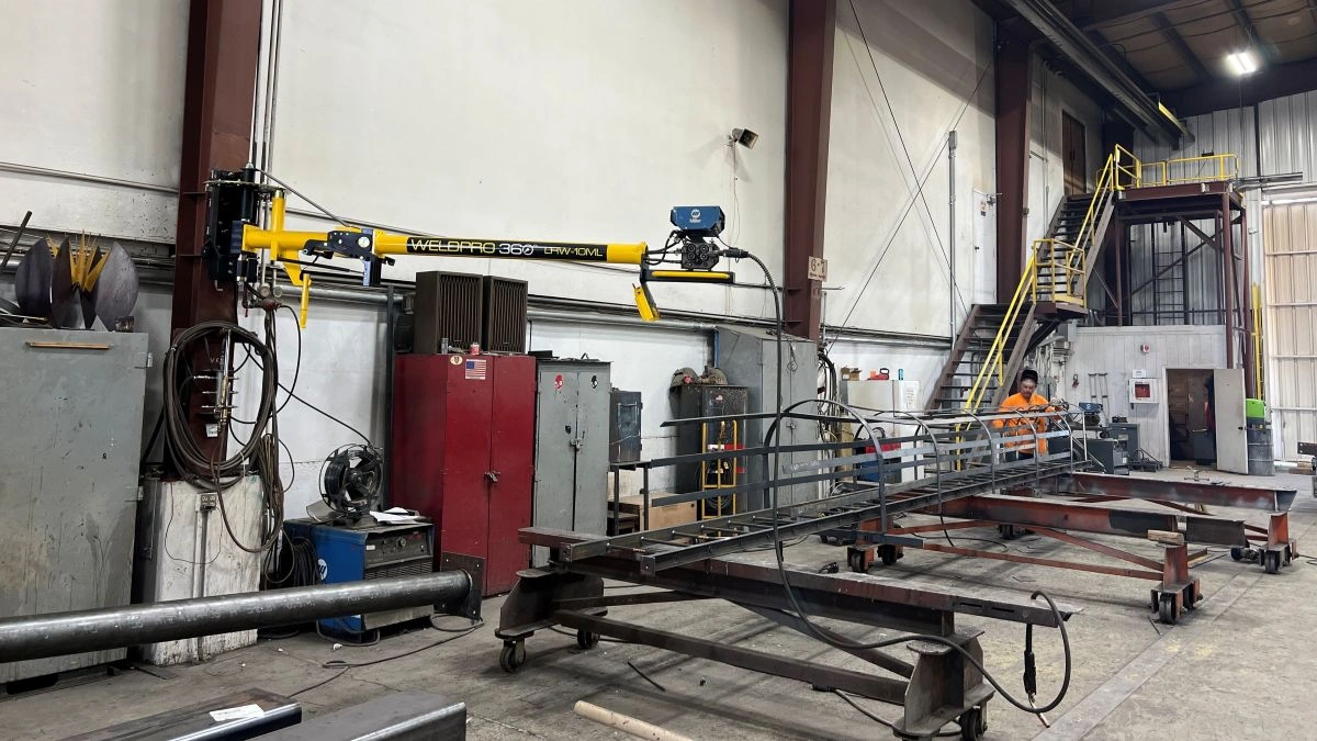 Welding a long ladder weldment with a WeldPro 360 LRW-10ML MIG Welding Boom Arm