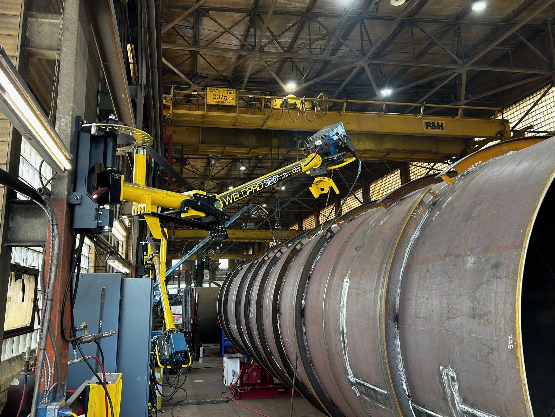 Welding a large cylindrical weldment with a WeldPro 360 LRW-10ML MIG Welding Boom Arm